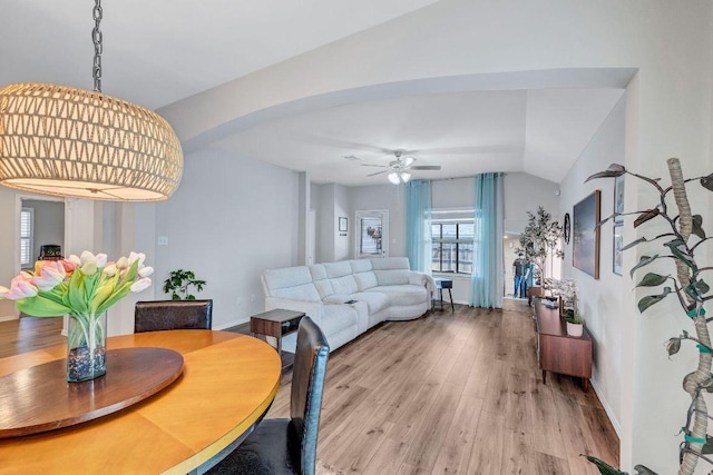 1904 T H Johnson Dr, Taylor, TX 76574 - dining space featuring vaulted ceiling, light wood-style flooring, and ceiling fan
