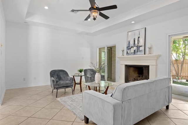 9601 Billingham Trl, Austin, TX 78717 - living room with a raised ceiling, light tile patterned floors, ceiling fan, a fireplace, and recessed lighting
