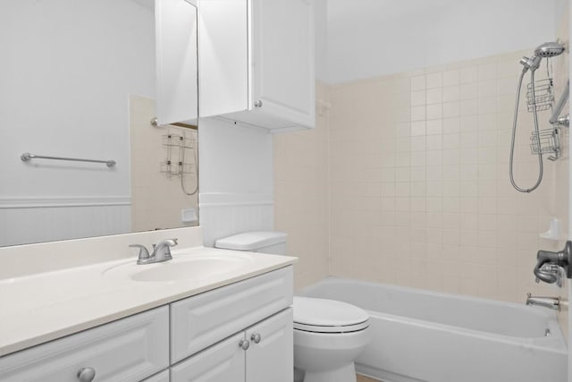 9601 Billingham Trl, Austin, TX 78717 - bathroom with vanity,  shower combination, and a wainscoted wall