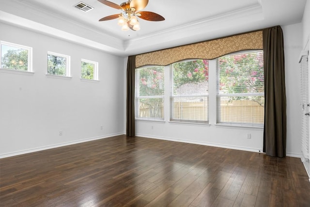 9601 Billingham Trl, Austin, TX 78717 - empty room with a raised ceiling, ceiling fan, crown molding, and dark wood finished floors