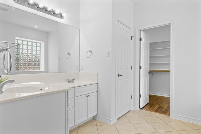 9601 Billingham Trl, Austin, TX 78717 - bathroom featuring double vanity and tile patterned floors