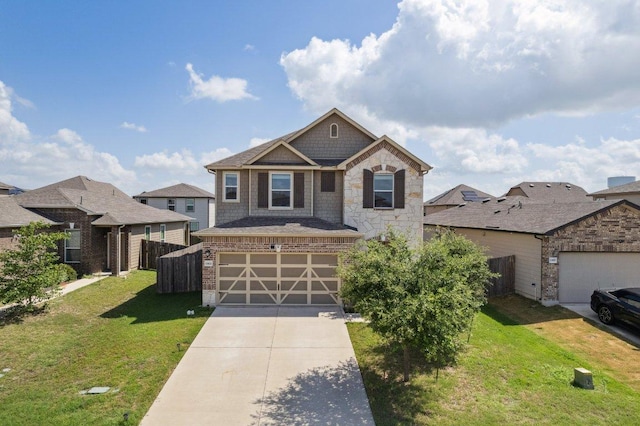 13821 Benjamin Harrison St, Manor, TX 78653 - view of front of house with concrete driveway, a garage, stone siding, and brick siding
