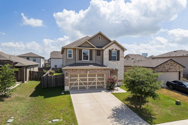 13821 Benjamin Harrison St, Manor, TX 78653 - craftsman house featuring concrete driveway, an attached garage, stone siding, and brick siding