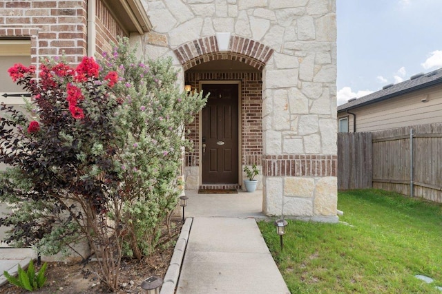 13821 Benjamin Harrison St, Manor, TX 78653 - entrance to property with brick siding and stone siding