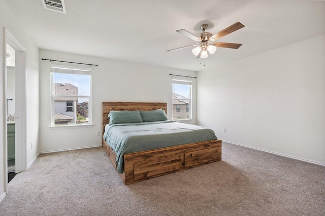 13821 Benjamin Harrison St, Manor, TX 78653 - bedroom featuring light colored carpet and a ceiling fan