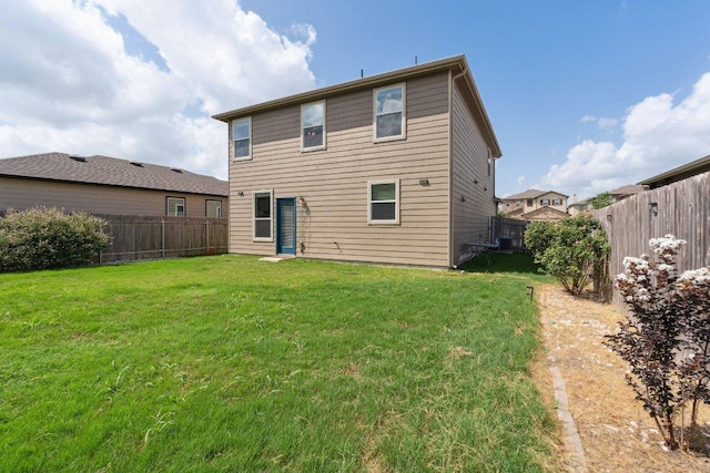 13821 Benjamin Harrison St, Manor, TX 78653 - back of house featuring a fenced backyard