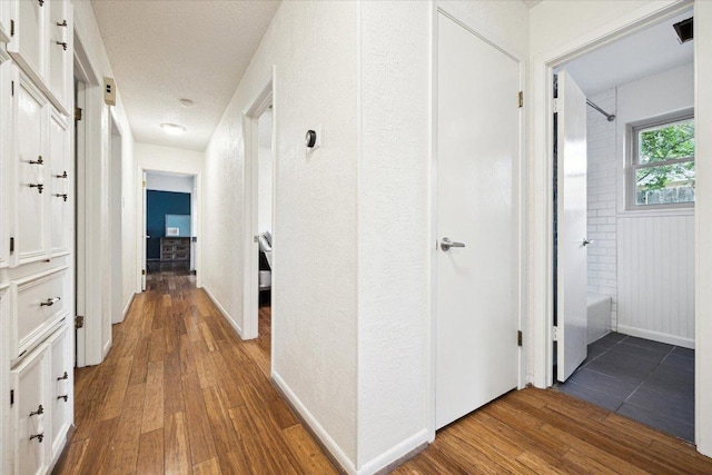 9902 Marseilles Dr, Austin, TX 78750 - hall featuring wood finished floors and baseboards