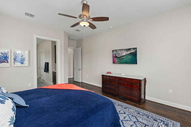249 Hopping Peach St, San Marcos, TX 78666 - bedroom with wood finished floors, a ceiling fan, and ensuite bath