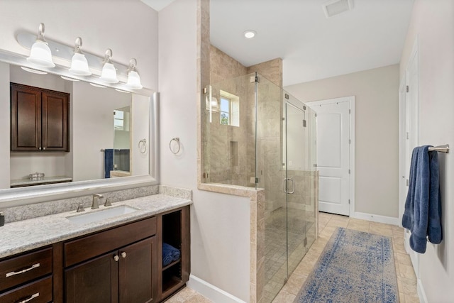 249 Hopping Peach St, San Marcos, TX 78666 - bathroom with a stall shower and vanity