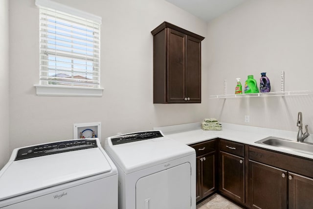 249 Hopping Peach St, San Marcos, TX 78666 - laundry area featuring washer and dryer and cabinet space