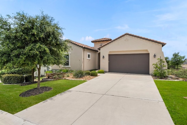 249 Hopping Peach St, San Marcos, TX 78666 - mediterranean / spanish home with a garage, a front yard, driveway, and stucco siding