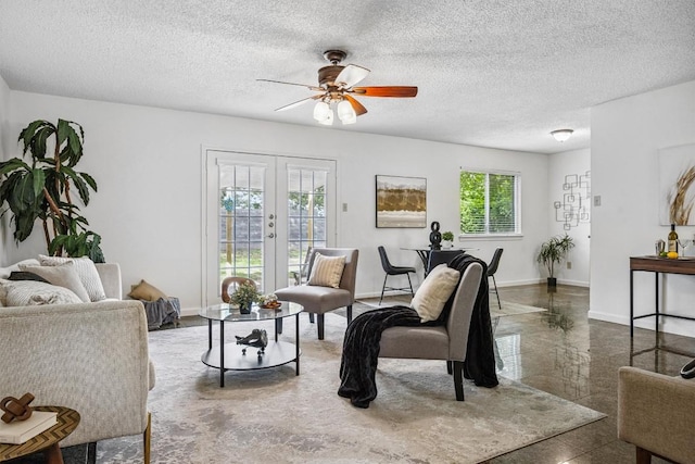 6308 Shadow Bnd, Austin, TX 78745 - living area with french doors, ceiling fan, granite tiled floors, and a textured ceiling