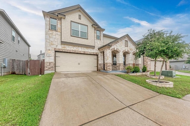 7517 Knockfin Dr, Austin, TX 78744 - view of front of property featuring a garage, stone siding, and concrete driveway