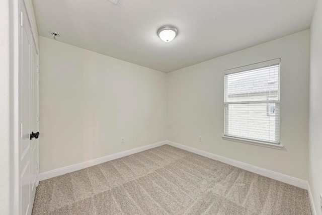 7517 Knockfin Dr, Austin, TX 78744 - unfurnished room with light carpet