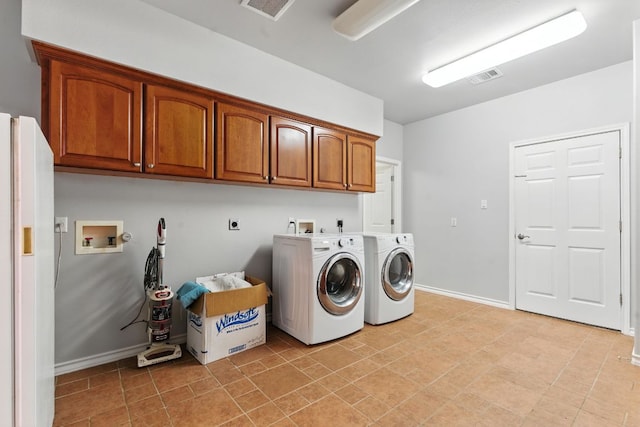 230 Hoffman Rd, Bastrop, TX 78602 - washroom featuring hookup for an electric dryer, cabinet space, and hookup for a washing machine
