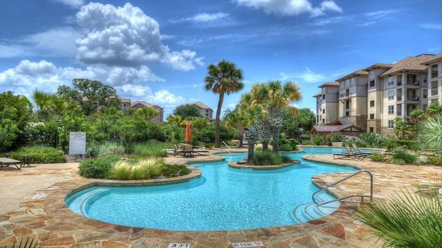 101 W Bank Unit 51, Horseshoe Bay, TX 78657 - community pool with a patio area