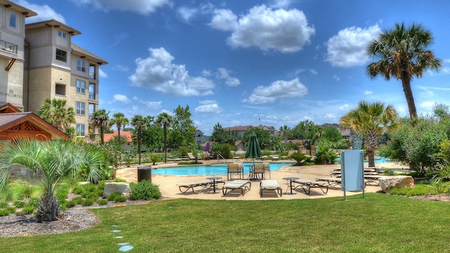101 W Bank Unit 51, Horseshoe Bay, TX 78657 - community pool featuring a lawn and a patio