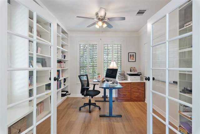 10636 Bramblecrest Dr, Austin, TX 78726 - home office with french doors, ceiling fan, light wood-style flooring, and ornamental molding
