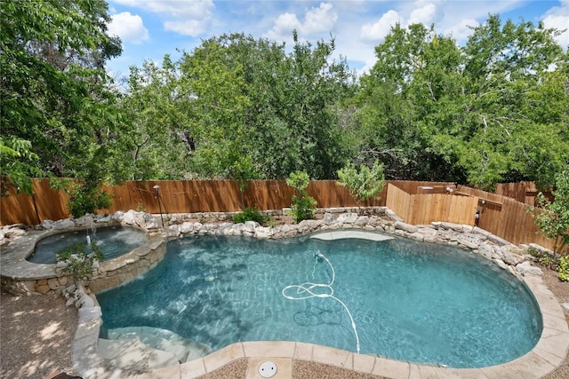 10636 Bramblecrest Dr, Austin, TX 78726 - view of swimming pool featuring an in-ground hot tub and a fenced backyard