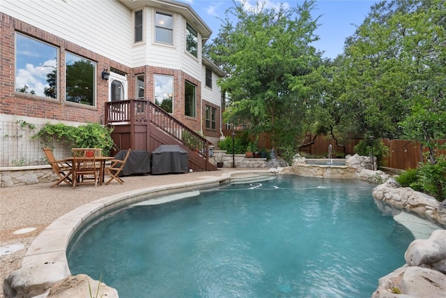 10636 Bramblecrest Dr, Austin, TX 78726 - view of pool with a fenced backyard, grilling area, a pool with connected hot tub, and a patio area