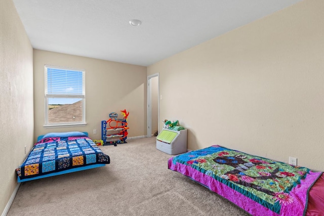 1698 Violet Ln, Kyle, TX 78640 - bedroom featuring carpet flooring and baseboards