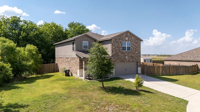 1698 Violet Ln, Kyle, TX 78640 - view of front of home with driveway, a garage, board and batten siding, stone siding, and brick siding