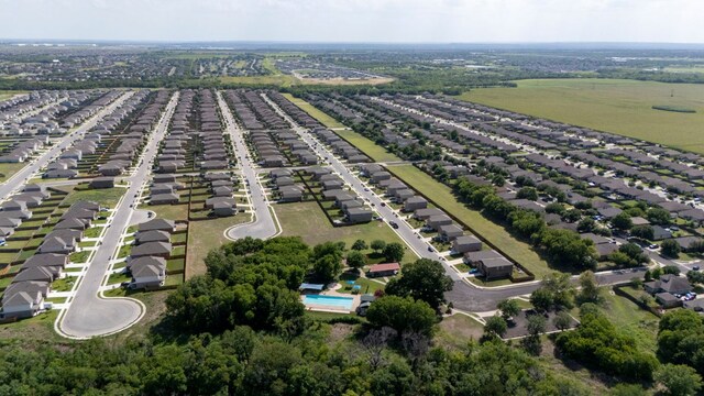 1698 Violet Ln, Kyle, TX 78640 - aerial view of property and surrounding area with nearby suburban area