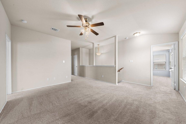 3303 Lorne Dr, Killeen, TX 76542 - carpeted empty room featuring a ceiling fan, lofted ceiling, and a smoke detector