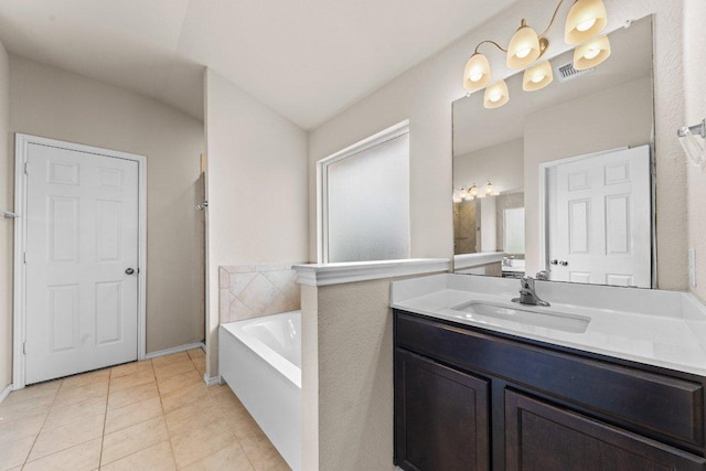 3303 Lorne Dr, Killeen, TX 76542 - bathroom with a garden tub, tile patterned flooring, and vanity