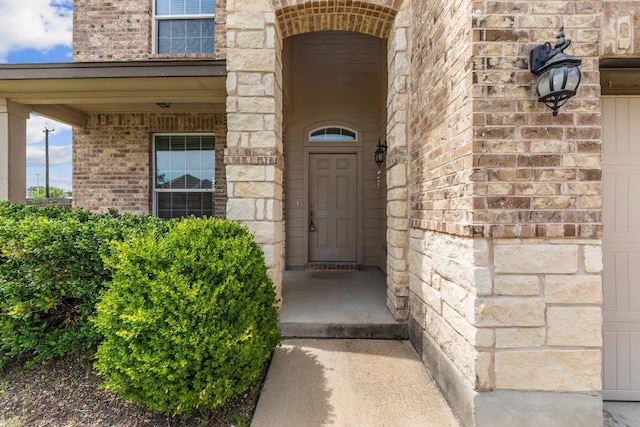 3303 Lorne Dr, Killeen, TX 76542 - view of exterior entry featuring stone siding and brick siding