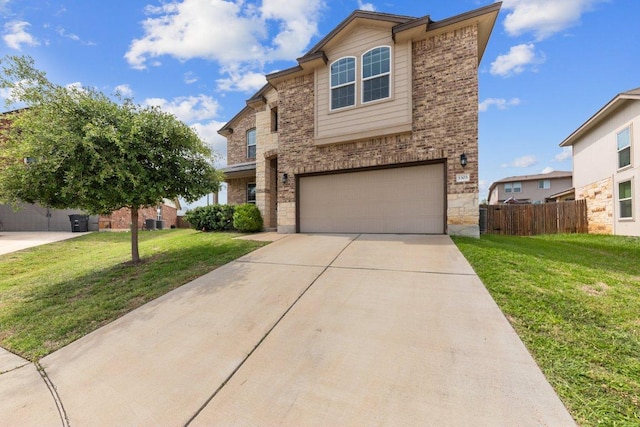 3303 Lorne Dr, Killeen, TX 76542 - traditional-style house featuring an attached garage, stone siding, brick siding, and driveway