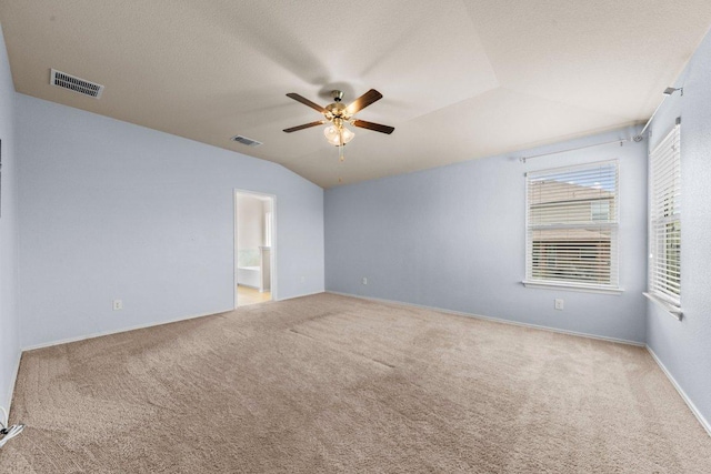 3303 Lorne Dr, Killeen, TX 76542 - empty room with carpet floors, ceiling fan, and lofted ceiling