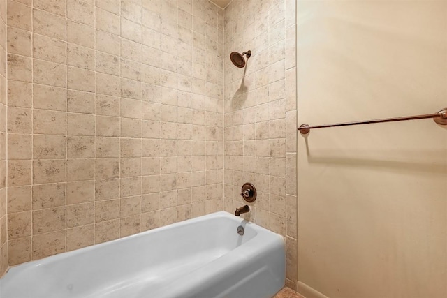230 Lido St Unit I-2, Lakeway, TX 78734 - bathroom featuring shower / washtub combination and baseboards