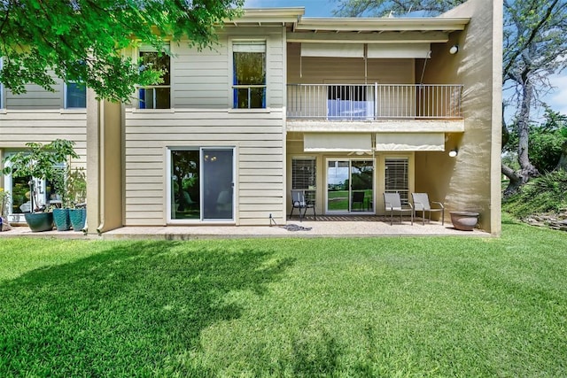 230 Lido St Unit I-2, Lakeway, TX 78734 - rear view of house with a balcony, a yard, and a patio area