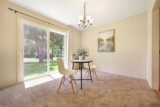 230 Lido St Unit I-2, Lakeway, TX 78734 - dining area with a chandelier and carpet floors
