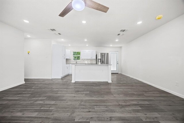 605 W Washington Ave, Copperas Cove, TX 76522 - unfurnished living room with ceiling fan, recessed lighting, and dark wood-style floors