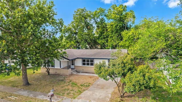 605 W Washington Ave, Copperas Cove, TX 76522 - view of front of house with brick siding, a shingled roof, and concrete driveway