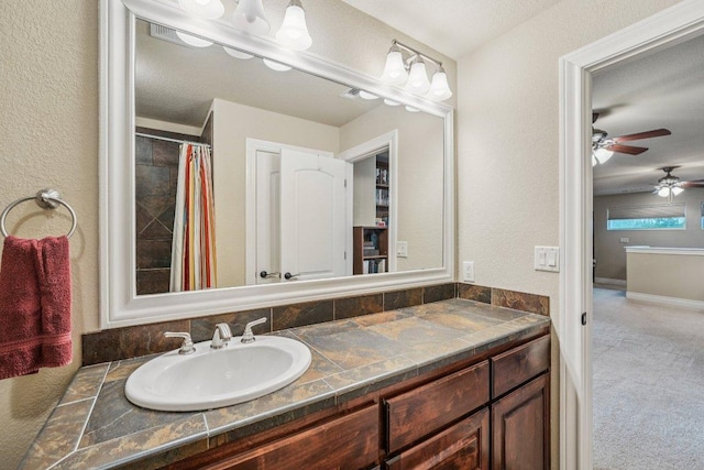 2010 American Dr Unit 2, Lago Vista, TX 78645 - full bathroom featuring a ceiling fan, vanity, and a shower with shower curtain