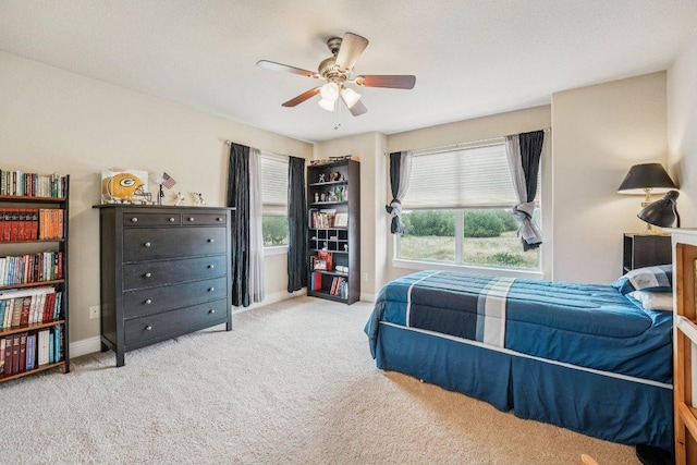 2010 American Dr Unit 2, Lago Vista, TX 78645 - carpeted bedroom with baseboards and a ceiling fan