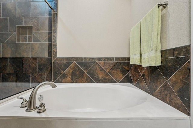 2010 American Dr Unit 2, Lago Vista, TX 78645 - bathroom featuring a garden tub