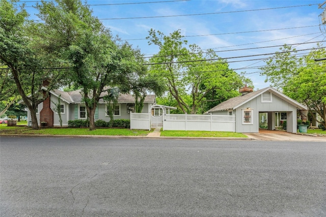 1502 Olive St, Georgetown, TX 78626 - view of front facade with a chimney