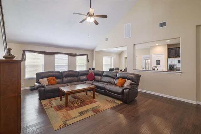 2524 Muzzie Ln, Leander, TX 78641 - living area featuring ceiling fan, dark wood-style flooring, and high vaulted ceiling