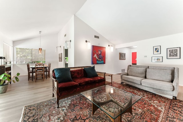 4903 Big Trail Cir, Austin, TX 78759 - living room with wood finished floors and high vaulted ceiling