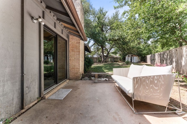 4903 Big Trail Cir, Austin, TX 78759 - fenced backyard with a patio area, a storage shed, and an outdoor hangout area