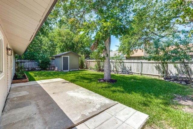 2515 Mcgregor Dr, Austin, TX 78745 - fenced backyard with a patio area and a storage unit