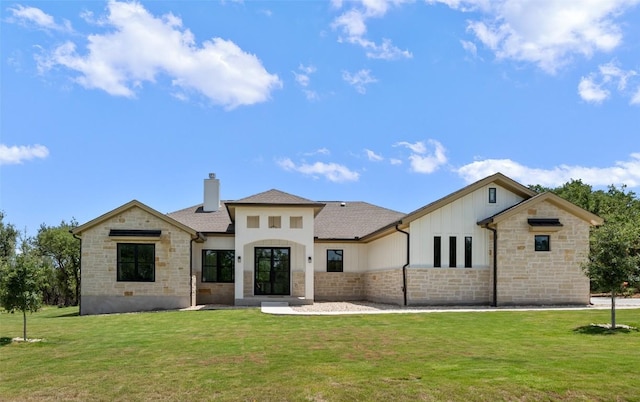 1129 Madrone Rd, Fischer, TX 78623 - view of front of house featuring stone siding, board and batten siding, a chimney, and a front yard