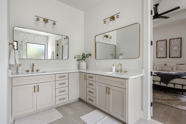 1129 Madrone Rd, Fischer, TX 78623 - full bath with a ceiling fan and double vanity