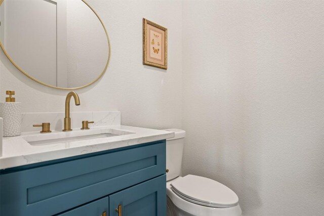 1129 Madrone Rd, Fischer, TX 78623 - half bath with vanity and toilet