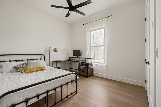 1129 Madrone Rd, Fischer, TX 78623 - bedroom featuring light wood-style flooring and a ceiling fan