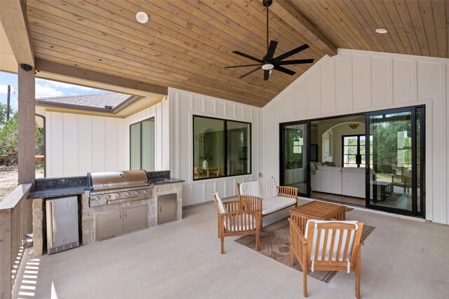 1129 Madrone Rd, Fischer, TX 78623 - view of patio with an outdoor kitchen, ceiling fan, and an outdoor living space